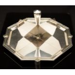 An Art Deco silver plated petit fours tray, octagonal form on four stepped segment baton feet,