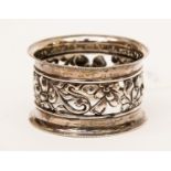 An Arts and Crafts, Art Nouveau style silver napkin ring,