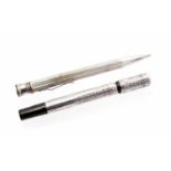 Silver safety pen and usus pencil,