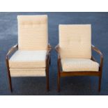 A pair of Danish teak easy chairs, circa 1960s, shaped arms and removable cushions,