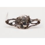 An Art Nouveau style silver brooch,