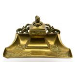 An Art Nouveau cast brass inkwell, circa 1910,