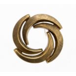 A Modernist Continental yellow metal brooch, interlocking crescents forming a circle, marked 333, 5.