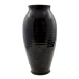 Gordon Forsyth, a studio pottery vase, elongated ovoid form, tenmoku glazed, incised GMF 1944,