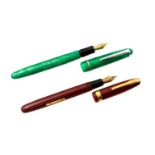 Waterman 515 fountain pen, red, together with an Osmeroid 65 fountain pen,