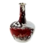 Bernard Moore for Minton, a Chang style bottle vase, sang de boeuf and white heavy drip glaze,