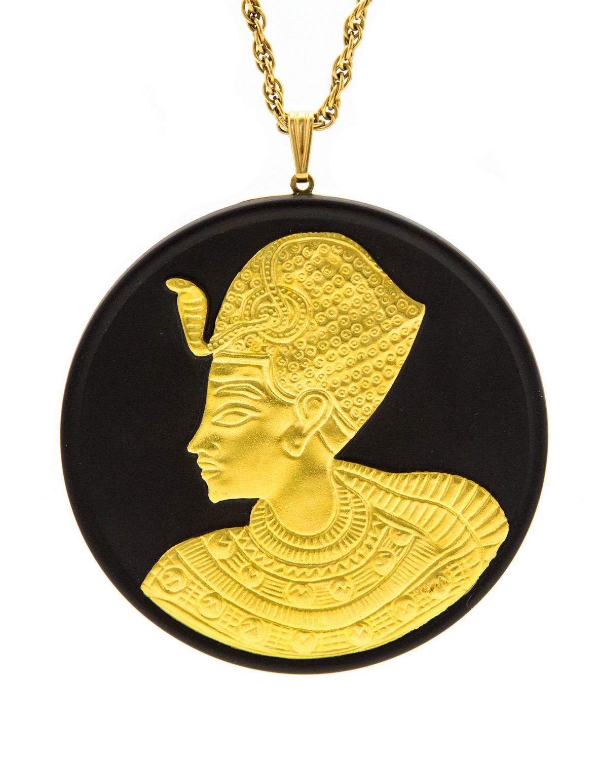 A Wedgwood 1970s gilt basalt Jasperware medallion, on yellow metal chain, Egyptian Pharaoh,