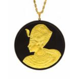 A Wedgwood 1970s gilt basalt Jasperware medallion, on yellow metal chain, Egyptian Pharaoh,