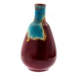 Bernard Moore, a Sang de Boeuf bottle vase, chimney form,