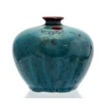 Bernard Moore, a high fired vase, squat ovoid form, turquoise with red rim and blotches, signed,