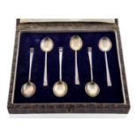 After Christopher Dresser for Hukin and Heath, a cased set of six silver coffee spoons,