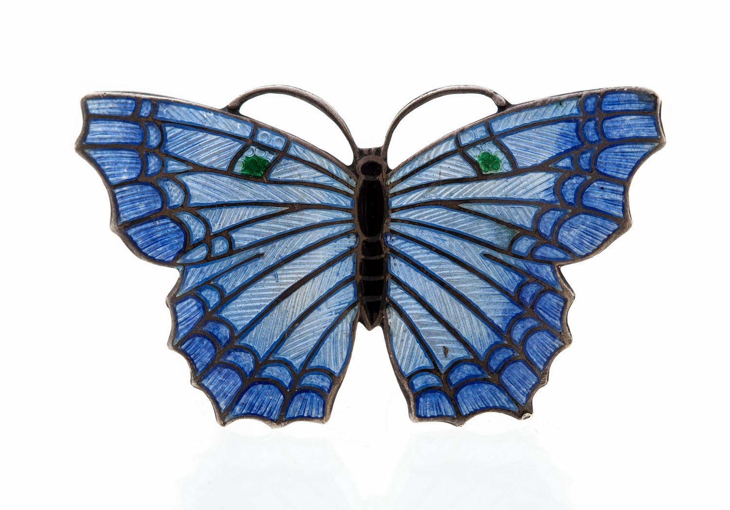 A silver and enamelled butterfly brooch, closionne and basse taille enamel in blue with green dots,