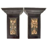 A pair of Art Nouveau repousse copper inset pilasters, the panels with stylised tulip motifs,