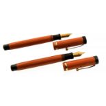 Two Parker Duofold Senior Fountain pens, flat top, red,