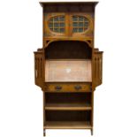 An Arts and Crafts oak bureau bookcase, in the style of G M Ellwood and Shapland and Petter,