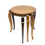 A set of three Art Deco oak occasional tables, circular form on three legs, with chrome nuts,