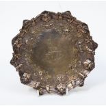 A George III silver waiter with rocaille border,