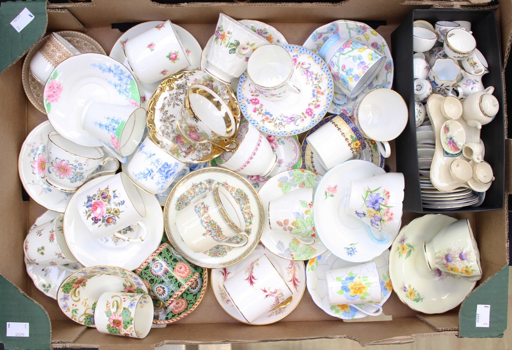 A collection of coffee cans and tea cups and saucers to include Shelley, Royal Crown Derby,