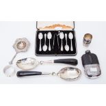 A cased set of Art Deco silver teaspoons, with sugar tongs,