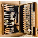 An early 20th Century oak cased canteen of cutlery containing six place settings,