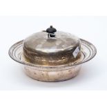 A silver plated muffin dish, liner and cover,