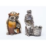 A heavy white metal cast figurine of a 'Flower Seller', together with an 'Owl' with painted detail,