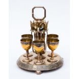 A circa 1880s electroplated egg stand in the Aesthetic manner