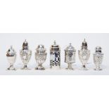 Seven various silver hallmarked pepperettes, one with liner, 7.