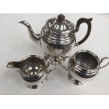 A three piece silver tea set, Sheffield 1928 James Deakin & Sons , approx 32.