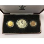 A three coin 1901-2001 Centenary Set Gold Sovereign 1901 and 2001 and Silver Proof £5 2001 in Royal