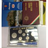A bag of World Coin sets includes UK 1970 proof set Canada uncirculated set 1998, greece 1926,