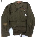 British 1949 Pattern Warrant Officers Battledress Blouse with original insgnia.