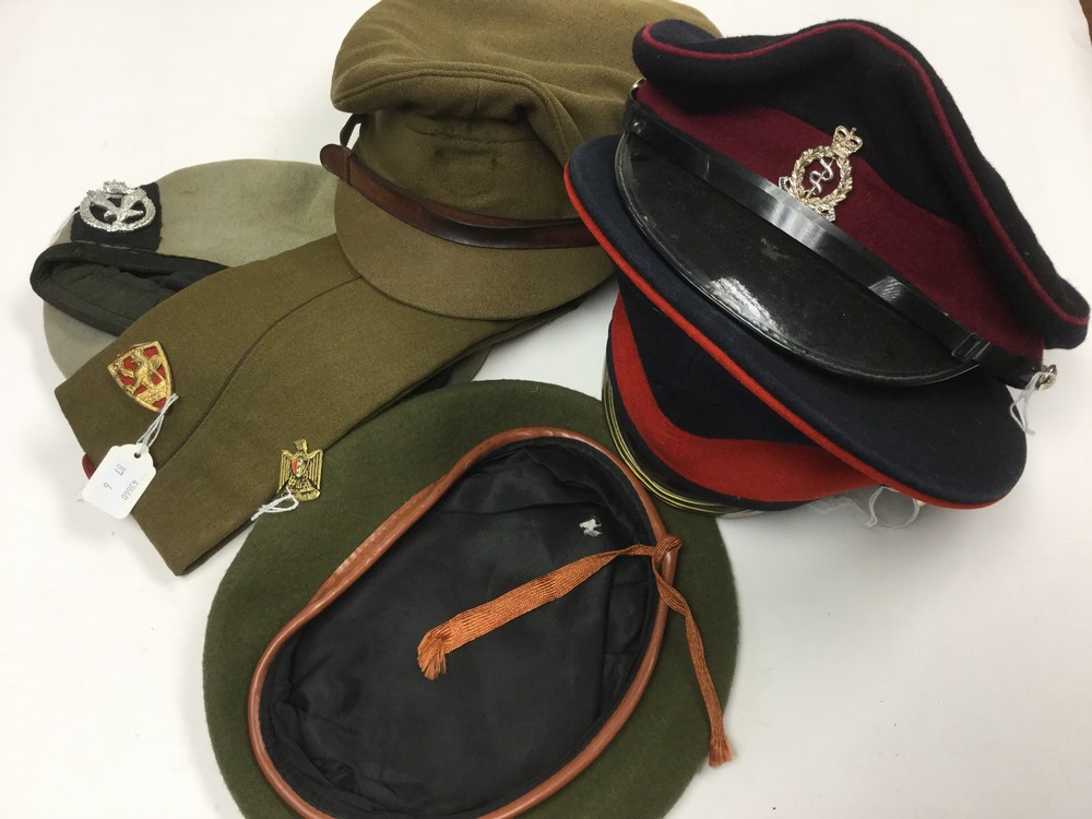 A collection of six post war caps: British Full Dress OR's cap with slashed Peak dated 1965,
