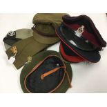 A collection of six post war caps: British Full Dress OR's cap with slashed Peak dated 1965,