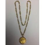 Gold two Pounds 1887 in a Victorian yellow metal mount with gold 9ct chain (25.