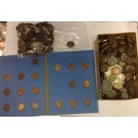 A bag and Whithan folder of Farthings with a box of World and UK Coins