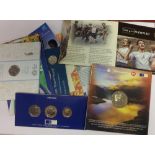 A bag of commemorative coin packs "Beatrix Potter Peter Rabbit" 50 Pence 2017,