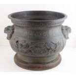 A large Chinese Daoist bronze censor, 19th century, in the form of a bowl with out swept rim, having