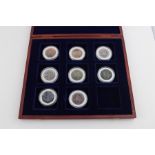 ***REOFFER HANSONS DERBY APRIL £40/£60***  A collection of eight 2009 "UK Coinage in Motion"