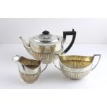 ***REOFFER HANSONS DERBY APRIL £250/£300***  A Victorian silver three piece tea set, the tea pot and