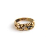 A 14ct. gold and diamond dress ring, of modern organic design set with four diamonds, each approx..