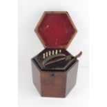 A 19th cent Cased Rosewood Concertina, serial number 22301 possibly Lachenal,Green leather bellows