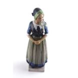 Dahl Jensen Copenhagen porcelain figure of a 'Girl in Regional Dress'. Ref 1142