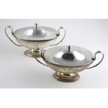 A pair of Georgian boat-shaped silver sauce tureens and covers, by Daniel Smith & Robert Sharp,