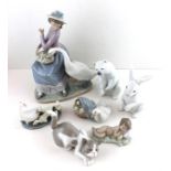 Lladro. Large seated girl with goose approx 24cms high. Along with 6 smaller Lladro animal