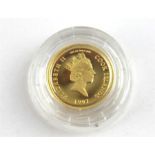 A 1997 Cook Islands 5 Dollar 1/25 troy ounce gold proof coin, .999 purity, having portrait of