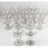 Set of 18 Victorian Glass Custard Cups. 11cms high. Together with a Victorian glass fruit bowl.