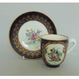 ***AWAY***A rare and very fine Worcester Coffee Cup & Saucer. Painted with floral sprays in