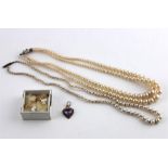 A 9ct. gold amethyst heart shaped pendant, stamped 9ct., together with two strings of pearls and a