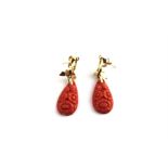 ***REOFFER HANSONS DERBY APRIL £80/£120***  A pair of gold, diamond and carved coral drop
